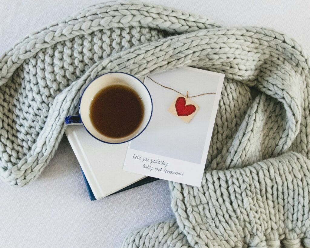 white ceramic mug on white knit textile for devotional A Father’s Love