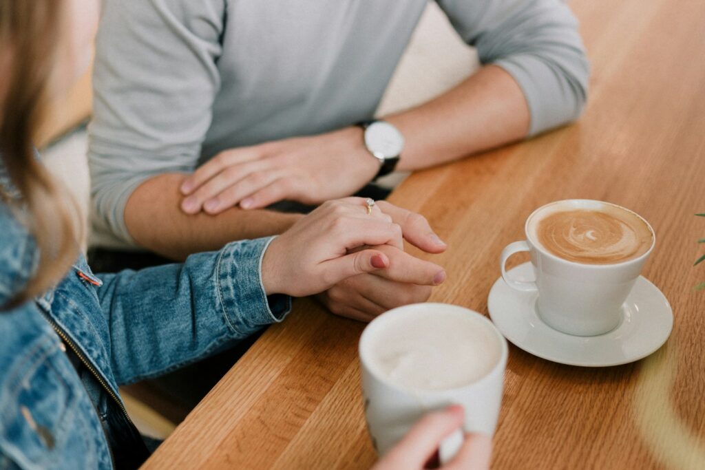 man and woman holding hands for blog post The Journey of Love