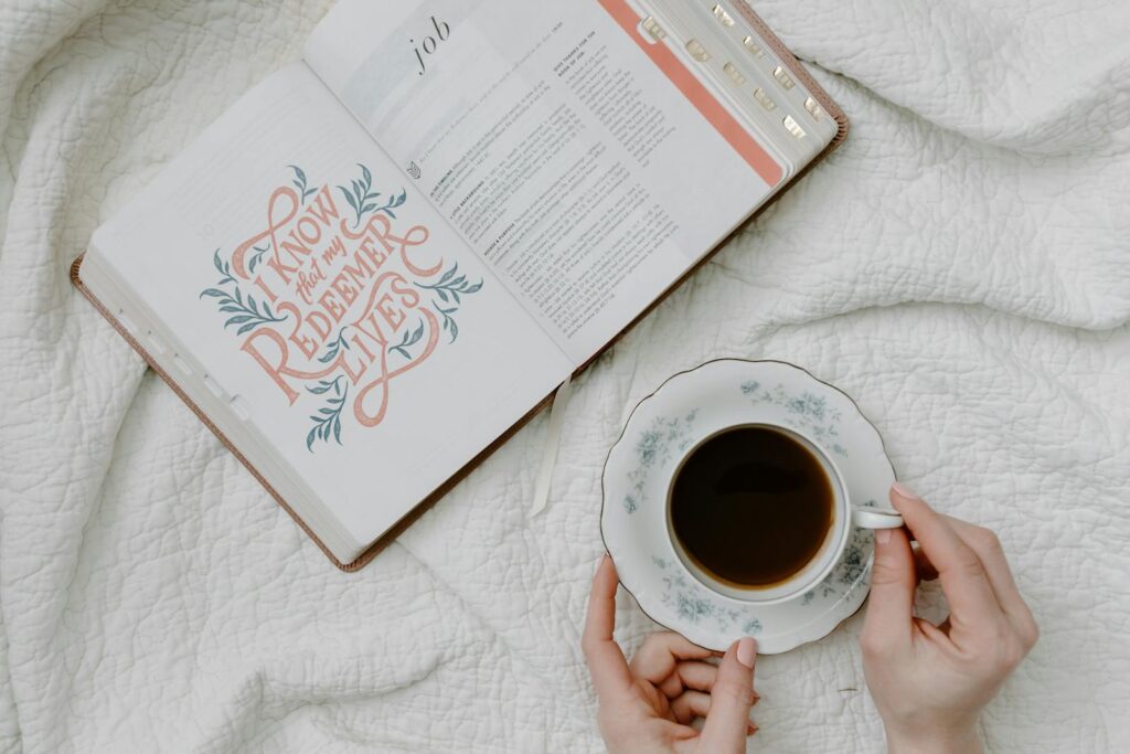 An open Bible with a quote and coffee, embodying a serene morning routine. for devotional God Given Talents