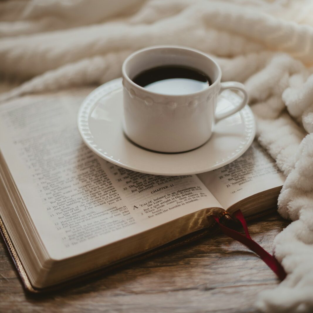 white ceramic cup on white ceramic saucer for blog post the Diary of Jesus